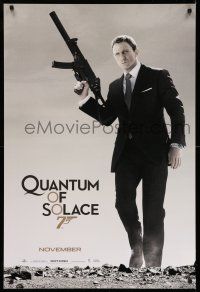 9k574 QUANTUM OF SOLACE teaser 1sh '08 Daniel Craig as Bond with silenced H&K UMP submachine gun