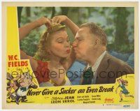 9r822 NEVER GIVE A SUCKER AN EVEN BREAK LC #5 R49 W.C. Fields puckers up to kiss sexy Susan Miller