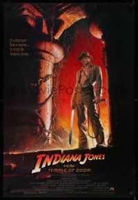 9w358 INDIANA JONES & THE TEMPLE OF DOOM 1sh '84 adventure is Ford's name, Bruce Wolfe art!
