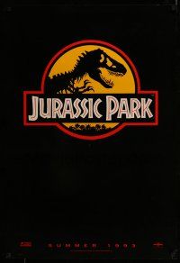 9w393 JURASSIC PARK teaser DS 1sh '93 Steven Spielberg, logo with T-Rex over yellow background!
