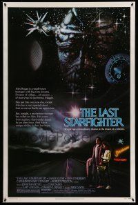 9w411 LAST STARFIGHTER 1sh '84 Lance Guest, great sci-fi art by Charles de Mar!