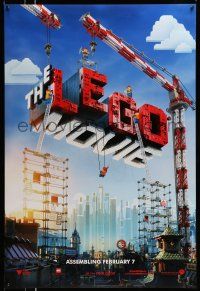 9w420 LEGO MOVIE teaser DS 1sh '14 cool image of title assembled w/cranes & plastic blocks!