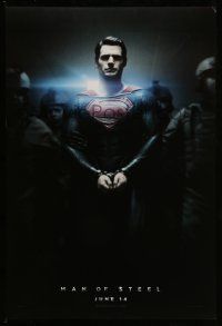9w462 MAN OF STEEL teaser DS 1sh '13 Henry Cavill in the title role as Superman handcuffed!
