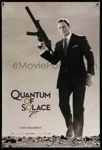1c621 QUANTUM OF SOLACE teaser 1sh '08 Daniel Craig as Bond with silenced H&K UMP submachine gun