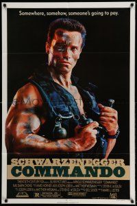 1f163 COMMANDO 1sh '85 Arnold Schwarzenegger is going to make someone pay!