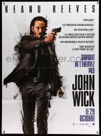 1g648 JOHN WICK teaser French 1p '14 cool full-length close up of Keanu Reeves pointing gun!