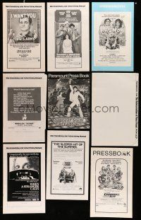 1h058 LOT OF 21 UNFOLDED UNCUT PRESSBOOKS '60s-80s advertising images from a variety of movies!