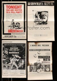 1h068 LOT OF 24 FOLDED CUT PRESSBOOKS '60s-70s advertising images from a variety of movies!