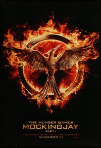 1k345 HUNGER GAMES: MOCKINGJAY - PART 1 teaser DS 1sh '14 logo, fire burns brighter in the darkness