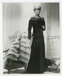 1m765 RITA HAYWORTH 7.75x9.75 still '65 posing in full gown by huge fur from The Money Trap!