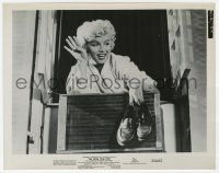 1m807 SEVEN YEAR ITCH 8x10.25 still '55 classic image of Marilyn holding shoes at apartment window!