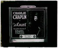 1x023 COUNT glass slide R20s scared Charlie Chaplin holding his cane in front of a door!