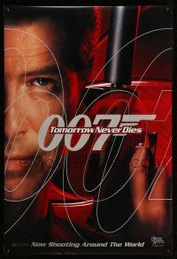 2c780 TOMORROW NEVER DIES teaser DS 1sh '97 close-up of Pierce Brosnan as James Bond 007!