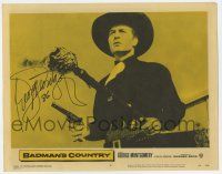 2d0058 BADMAN'S COUNTRY signed LC #5 '58 by George Montgomery, who's holding his gun & torch!