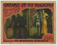 2f640 DRUMS OF FU MANCHU chapter 1 LC '40 full-color, Asian woman hides behind suit of armor!