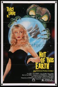 2m729 NOT OF THIS EARTH 1sh '88 sexy Traci Lords, artwork of creepy bug-eyed alien!