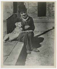 2s273 DOG'S LIFE 8x10 still R60s happy Charlie Chaplin as Tramp seated on street with his dog!