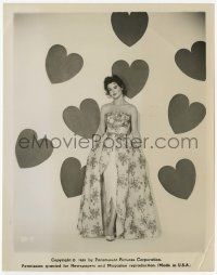 2s904 TINA LOUISE 8x10.25 still '58 the sexy actress standing in low-cut dress by wall of hearts!