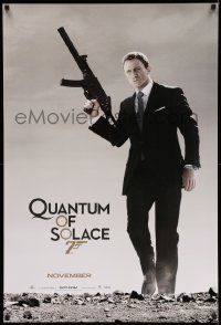2z613 QUANTUM OF SOLACE teaser DS 1sh '08 Daniel Craig as Bond with silenced H&K UMP submachine gun
