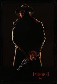 2z800 UNFORGIVEN teaser 1sh '92 image of gunslinger Clint Eastwood w/back turned, dated design!