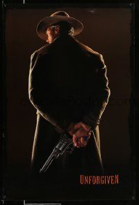 2z801 UNFORGIVEN teaser 1sh '92 image of gunslinger Clint Eastwood w/back turned, undated design!
