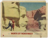 3k033 NORTH BY NORTHWEST LC #5 '59 classic image of Cary Grant & Eva Marie Saint on Mt. Rushmore!