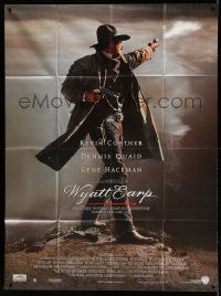 3y995 WYATT EARP French 1p '94 full-length image of cowboy Kevin Costner shooting gun!