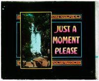 4a122 JUST A MOMENT PLEASE glass slide '20s cool art, put on the screen when the film broke!