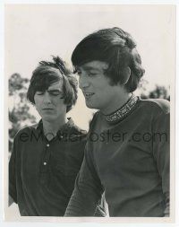 4d361 JOHN LENNON/GEORGE HARRISON 7x9 news photo '65 two of The Beatles outdoors w/windblown hair!