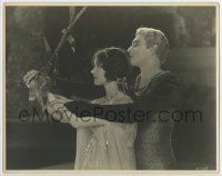 4s052 BELOVED ROGUE deluxe 11x14 still '27 John Barrymore and Marceline Day holding onto branch!