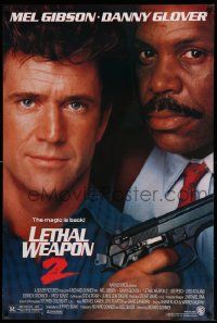 4w531 LETHAL WEAPON 2 1sh '89 great close-up image of cops Mel Gibson & Danny Glover!