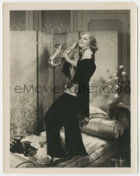 4x246 DEVIL'S HOLIDAY 8x10.25 still '30 great image of sexy Nancy Carroll playing saxophone on bed!