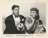 4x707 PALM BEACH STORY 8x10.25 still '42 Claudette Colbert is unsure about Rudy Vallee's gift!