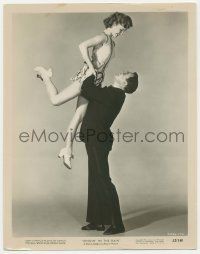 4x809 SINGIN' IN THE RAIN 8x10.25 still '52 best image of Gene Kelly holding Debbie Reynolds up!