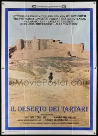 4y145 DESERT OF THE TARTARS Italian 2p '76 cool far shot of soldier riding away from fortress!