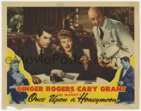 5c808 ONCE UPON A HONEYMOON LC '42 Ginger Rogers shows something to Cary Grant & restaurant waiter!