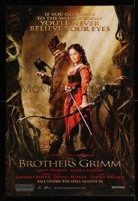 5g133 BROTHERS GRIMM teaser DS 1sh '05 Lena Headey with bow & arrow, you'll never believe your eyes