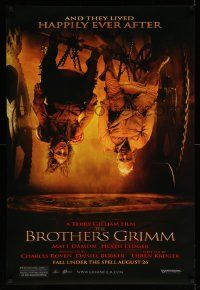 5g135 BROTHERS GRIMM teaser DS 1sh '05 old Matt Damon & Ledger are upside-down, happily ever after!