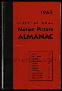 5h241 INTERNATIONAL MOTION PICTURE ALMANAC hardcover book '63 loaded with great information!