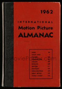 5h240 INTERNATIONAL MOTION PICTURE ALMANAC hardcover book '62 loaded with great information!