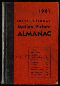 5h239 INTERNATIONAL MOTION PICTURE ALMANAC hardcover book '61 loaded with great information!