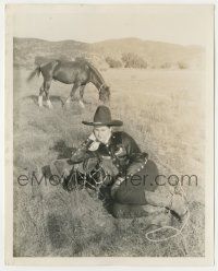 5m189 BOB REEVES deluxe 8x10 still '20s on the ground with his saddle with his horse behind him!