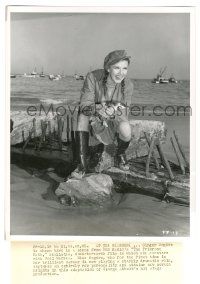 5m733 PRIMROSE PATH 8.25x10 still '40 c/u of Ginger Rogers holding baby bird at seashore by Miehle!