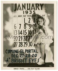 5m810 SHIRLEY TEMPLE 8x10 still '34 the cute child star standing by the new calendar for 1935!