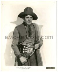 5m946 UNDER THE PAMPAS MOON 8x10 still '35 great portrait of Gaucho Lover Warner Baxter with whip!