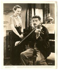 5m964 WE ARE NOT ALONE 8.25x10 still '39 pretty Jane Bryan smiles at Paul Muni playing violin!