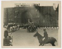 5m966 WEDDING MARCH candid 8x10.25 still '28 soldiers on parade before cathedral with movie banner!