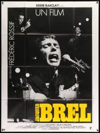 5p689 BREL French 1p '82 Ines De La Fressange, Jacques Brel singing into microphone!