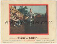 5w636 EAST OF EDEN LC #1 '55 concerned James Dean running past sitting men, John Steinbeck, Kazan!