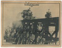 5w708 HURRICANE HUTCH chapter 2 LC '21 image on motorcycle beating train across bridge, lost serial!